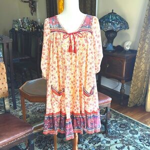 FREE PEOPLE orange and ivory floral printed flowy boho style dress